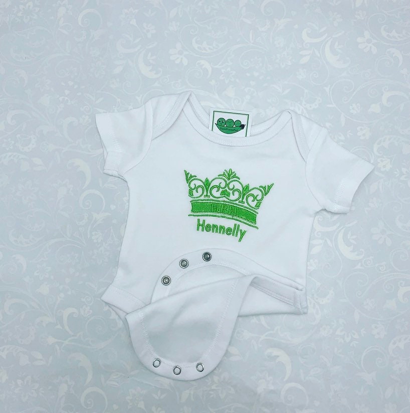 Personalised baby bodysuit embroidered in Green with a crown and baby's name. 