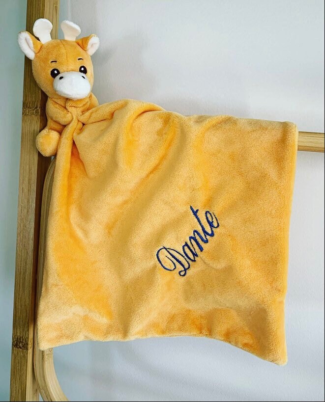 Giraffe Baby comforter personalised with baby's name in blue thread. 